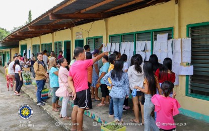 <p><strong>NEW VILLAGE.</strong> Voters line up outside a polling precinct in Tupi town, South Cotabato province on Saturday (July 13, 2024). A total of 2,393 or 96.30 percent voted to create another barangay in the municipality during the plebiscite, the Commission on Elections said. <em>(Photo courtesy of Comelec)</em></p>