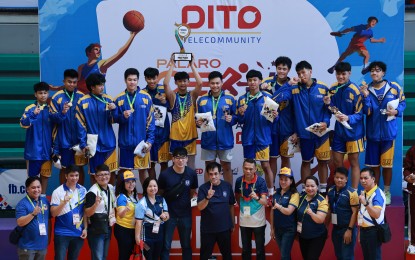 <p><strong>CHAMPION.</strong> Members of the National Capital Region team that won the Palarong Pambansa secondary boys' basketball title during the awarding ceremony at University of San Carlos gym in Cebu City on Monday (July 15, 2024). NCR defeated Central Luzon, 86-71, in the final. <em>(Photo courtesy of PSC Media Pool) </em></p>