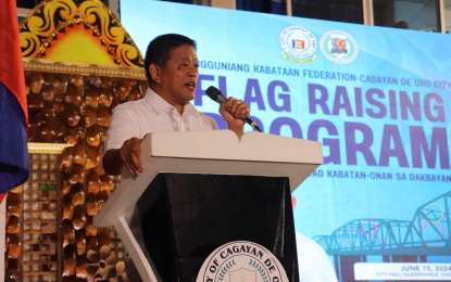 <p><strong>WORLD RECORD.</strong> Cagayan de Oro City Administrator Roy Hilario Raagas speaks before city government employees and guests during the flag-raising program at the city hall on Monday (July 15, 2024). Raagas said the city government will join the bid to enter the Guinness Book of World Records for most bamboo planted in an hour on Sept. 18.<em> (Photo courtesy of CDO CIO)</em></p>