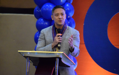 <p><strong>NO INCREASE.</strong> Bureau of Internal Revenue commissioner Romeo Lumagui Jr. speaks to a crowd of stakeholders in Cagayan de Oro City for the regional roadshow on the implementation of Republic Act (RA) 11976 or the Ease of Paying Taxes (EOPT) Act. Lumagui said that instead of increasing tax rates, the government will maximize the use of EOPT for efficient collection. <em>(Photo courtesy of MisOr PIO)</em></p>