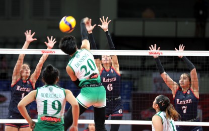 <p><strong>THIRD PLACE.</strong> College of Saint Benilde wing spiker Rhea Mae Densing (No. 20) tries to score off Letran opposite Marie Judiel Nitura (No. 1) and middle blocker Angelique Ledesma (No. 6) in Game 2 of the 2024 Shakey’s Super League National Invitationals best-of-three battle for bronze at Ninoy Aquino Stadium in Manila on Tuesday (July 16, 2024). The Lady Blazers won, 25-23, 14-25, 25-19, 20-25, 15-17, to sweep the series and secure third place. <em>(PNA photo by Jess M. Escaros Jr.)  </em></p>