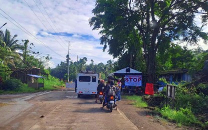 <p>An ASF quarantine checkpoint mounted along the Antipas-Pres. Roxas highway in North Cotabato province. <em>(File photo by John Andrew Tabugoc)</em></p>