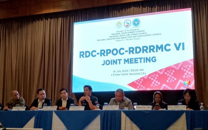 <p><strong>REGIONAL SECURITY CONCERNS</strong>. Bacolod City Mayor Alfredo Abelardo Benitez (center), chairperson of Regional Development Council (RDC)-Western Visayas (Region 6), presides the joint meeting of the RDC-6, Regional Peace and Order Council-6 and Regional Disaster Risk Reduction and Management Council-6 held at L’ Fisher Hotel in Bacolod City Thursday (July 18, 2024). The meeting seeks to develop a unified approach to regional security aligned with the administration's national security policy. <em>(PNA photo by Nanette L. Guadalquiver)</em></p>