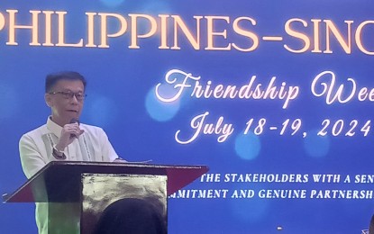 <p><strong>FRIENDSHIP WEEK.</strong> Migrant Workers Secretary Hans Leo Cacdac expresses the Philippine government's gratitude to the Singaporean government, through Ambassador Constance See, during the opening of the Philippines-Singapore Friendship Week on Thursday (July 18, 2024) at the DMW office in Mandaluyong City.  Cacdac said Singapore has strong labor laws that protect migrant workers. <em>(PNA photo by Marita Moaje)</em></p>