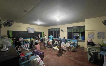 <p><strong>EVACUATION</strong>. Families stay at the Nagdayao Elementary School following their preemptive evacuation on Thursday (July 18, 2024). Antique Provincial Disaster Risk Reduction and Management officer Broderick Train said during an interview Friday (July 19) that two persons died while 335 families were pre-emptively evacuated for their safety due to the low-pressure area that affected the province. <em>(Photo courtesy of Antique provincial government)</em></p>