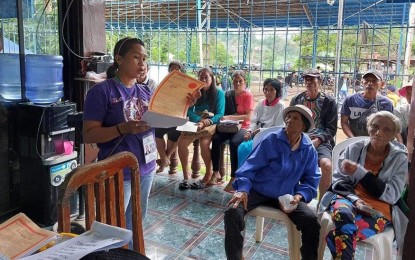 <p><strong>LAND TITLES</strong>. Personnel of the Department of Agrarian Reform Negros Occidental 2 (South) gives an orientation during the distribution of the land titles to 37 farmer-beneficiaries Moises Padilla, Negros Occidental on Thursday (July 18, 2024). They obtained certificates of land ownership award to the agricultural properties previously owned by three individuals in Barangay Quintin Remo. <em>(Photo courtesy of DAR Negros Occidental 2)</em></p>