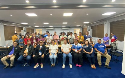 <p><strong>PRISAA IN LEGAZPI</strong>. Mayor Geraldine Rosal (4th from left, seated) join officials of the 2024 Private Schools Athletic Association (PRISAA) and the local government of Legazpi City, Albay at a press conference at the city hall on Saturday (July 20, 2024). The local government is expected to gain more than PHP50 million in revenues from the sporting meet slated until July 26. <em>(PNA photo by Connie Calipay)</em></p>