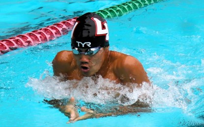 <p><strong>TRIUMPHANT. </strong>Jamesray Mishael Ajido competes in the boys' 15 years old 100m Individual Medley event in the Speedo Sprint Meet at the Teofilo Yldefonso pool inside the Rizal Memorial Sports Complex (RMSC) in Malate, Manila on Sunday (July 21, 2024). He won the gold medal in 59.74 seconds. <em>(Contributed photo) </em></p>