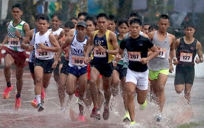 <p><strong>FIRST GOLD.</strong> Cebuano Mark Mahinay (No. 341) ​leading the men's 5,000-meter ​race in the 2024 Private Schools Athletic Association (PRISAA) National Games at the Bicol University track and field stadium ​on July 22, 2024​. He won in 15:22.9. <em>(Photo courtesy of PRISAA) </em></p>