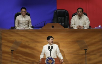 <p><strong>THUMBS UP</strong>. President Ferdinand R. Marcos Jr. delivers his 3rd State of the Nation Address (SONA) at the Batasang Pambansa on Monday (July 22, 2024). Bicolanos gave the speech a thumbs up as they agreed that government programs and projects have changed their lives for the better. <em>(Screenshot from RTVM)</em></p>