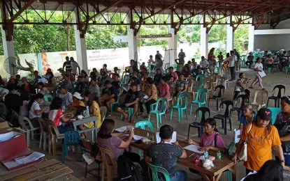 <p><strong>GOV'T AID</strong>. The payout in Eastern Samar for the beneficiaries of the Project LAWA at BINHI, designed to mitigate the impact of food insecurity and water scarcity. The Department of Social Welfare and Development has paid over PHP9 million to beneficiaries in four Eastern Samar towns for the first regional rollout of the program.<em> (Photo courtesy of DSWD Region 8)</em></p>