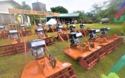 <p><strong>NEW FARM MACHINERY</strong>. The brand-new floating tillers distributed by the Negros Occidental provincial government to 13 farmers associations starting last week. The province purchased 15 units worth PHP78,000 each, or a total of PHP1.17 million. (<em>Photo courtesy of PIO Negros Occidental)</em></p>