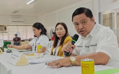 <p><strong>READY.</strong> Department of Education (DepEd) Eastern Visayas assistant regional director Ronelo Firmo (right) answers media queries during a press briefing on July 25, 2024, in Palo, Leyte.  At least 720,595 learners in Eastern Visayas have signed up for this new school year as the DepEd steps up its preparation for the opening of classes on July 29. <em>(PNA photo by Sarwell Meniano)</em></p>