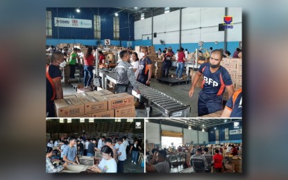 <p><strong>SPIRIT OF VOLUNTEERISM</strong>. Volunteers help prepare family food packs (FFPs) at the National Resource Operations Center in Pasay City on Friday (July 26, 2024). The boxes of FFPs that are being produced by the volunteers will replenish the relief supplies that were distributed to families and individuals affected by Super Typhoon Carina and enhanced southwest monsoon. <em>(Photo courtesy of DSWD)</em></p>