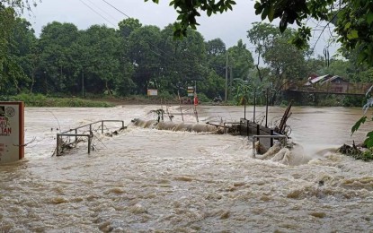 <p><strong>FLASH FLOOD.</strong> A spillway is flooded in Pozorrubio town, Pangasinan on July 25, 2024. Rizal Commercial Banking Corporation chief economist Michael Ricafort on Monday (July 29, 2024) said a 25 basis points (bps) interest rate cut next month is still possible despite the projected slight hike in consumer prices due to the effects of Super Typhoon Carina and enhanced southwest monsoon. <em>(Photo courtesy of Pozorrubio Councilor Dennis Uy's Facebook account)</em></p>