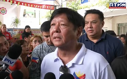 <p><strong>SITE INSPECTION</strong>. President Ferdinand R. Marcos Jr. during a chance interview while conducting a site inspection at the calamity-stricken Rizal on Friday (July 26, 2024). President Marcos said the opening of classes in public schools will push through as planned on Monday. (Photo courtesy of RTVM)</p>