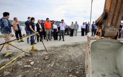 <p style="text-align: left;"><strong>INSPECTION</strong>. President Ferdinand R. Marcos Jr. inspects the Mauban Sea Wall and Mauban Port in Quezon on Friday (July 26, 2024) in the aftermath of Typhoon Carina and an enhanced southwest monsoon. The President also held a situational briefing with local chief executives and heads of concerned agencies. <em>(Photo from PCO Facebook)</em></p>