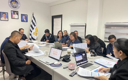 <p><strong>TOP 10 IMPORTERS</strong>. Bureau of Customs - Sub-port of Mactan personnel, headed by Collector Gerardo Campo (seated, far end), meet with the collection team in Cebu in this file photo. Campo cited the Top 10 importers in the Sub-port of Mactan for paying PHP876 million in duties and taxes that have contributed to the PHP1.2 billion total revenue collected during the first half of 2024. <em>(Photo courtesy of BOC-Mactan)</em></p>