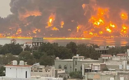 <p><strong>PORT ATTACK.</strong> Smoke and flames rise from a site in Hodeidah, Yemen on July 20, 2024. President Ferdinand R. Marcos Jr. said Saturday (July 27) the 17 Filipinos who are currently being held hostage by the Houthi group are “all safe” from the recent Israeli attack on Yemen’s port. <em>(Photo courtesy of the UN Office for the Coordination of Humanitarian Affairs)</em></p>