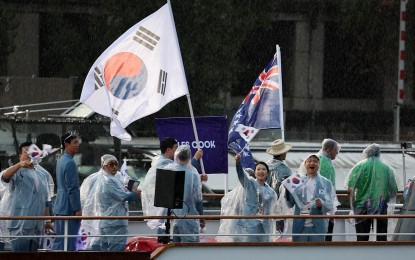 <p><strong>MAJOR ERROR.</strong> The South Korean delegation to the Paris Olympics rides a boat on the Seine River during the opening ceremony on Friday (July 26, 2024). The country was incorrectly identififed as Republique populaire democratique de Coree (Democratic People's Republic of Korea or North Korea<em>). (Yonhap)</em></p>