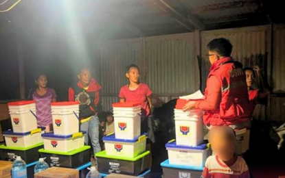 <p><strong>AID DISTRIBUTION.</strong> Personnel of the Department of Social Welfare and Development (DSWD) distribute assistance to the victims of Super Typhoon Carina and enhanced southwest monsoon in this undated photo. The DSWD on Monday (July 29, 2024) said distributed humanitarian aid has reached the PHP200-million mark. <em>(Photo courtesy of DSWD)</em></p>