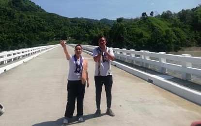 <p><strong>NASULI BRIDGE.</strong> Senator Loren Legarda (left) and Antique Rep. Antonio Agapito Legarda at the Nasuli bridge in San Remigio, Antique, on Saturday (July 27, 2024). Legarda said San Remigio, the Little Baguio of Antique because of its cool climate and beautiful mountain sceneries, will soon become the Baguio of Panay because of interconnectivity. <em>(PNA photo by Annabel Consuelo J. Petinglay)</em></p>