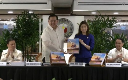 <p><strong>2025 BUDGET.</strong> Budget Secretary Amenah Pangandaman (2nd from right) turns over the 2025 National Expenditure Program (NEP) to House Speaker Ferdinand Martin Romualdez (2nd from left) in a ceremony on Monday (July 29, 2024) at the House of Representatives. The NEP lays out the government’s spending plan for the proposed 2025 budget amounting to PHP6.352 trillion.<em> (Screengrab from House of Representatives Facebook page)</em></p>