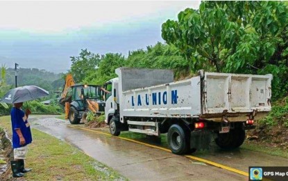 <div dir="auto"><strong>AFTERMATH</strong>. The provincial government clears the roads of Naguilian town, La Union of debris following the onslaught of Super Typhoon Carina last week. The province incurred PHP59.9 million losses in agriculture, infrastructure, and tourism from the effects of the weather disturbance. <em>(Photo courtesy of Province of La Union)</em></div>