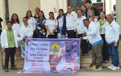 <p><strong>OLYMPIANS AID.</strong> The families of two weightlifters competing at the Paris Olympics 2024 pose with Acting Mayor Raymond Alvin Garcia at the city hall on Monday (July 29, 2024), shortly after receiving the PHP200,000 in cash aid for each. Garcia promised to give PHP1 million if they can clinch a gold, PHP500,000 for silver and PHP300,000 for bronze. <em>(Photo courtesy of Cebu City-PIO)</em></p>