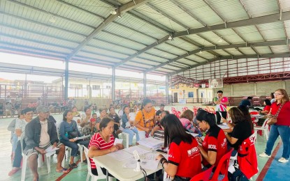 <p><strong>LIVELIHOOD FUND</strong>. Residents of Aroroy town in Masbate province receive cash assistance under the Department of Social Welfare and Development's Sustainable Livelihood Program on July 25, 2024. Around 321 individuals were given additional financial resources for their businesses<em>. (Photo courtesy of DSWD-Bicol)</em></p>