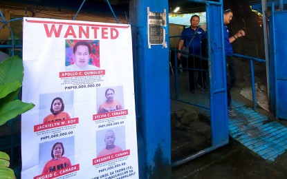 <p><strong>END OF THE LINE.</strong> A “wanted” tarpaulin of religious leader Apollo Quiboloy and his aides hangs outside the San Pedro Police Station in Davao City on July 29, 2024. The five surrendered on Sunday (Sept. 8) after the police issued a 24-hour ultimatum to come out or they will raid their hiding place at the Kingdom of Jesus Christ compound in Buhangin District. <em>(PNA photo by Robinson Niñal Jr.)</em></p>