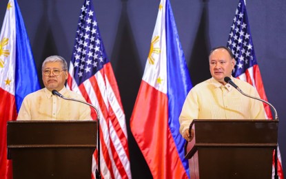 <p><strong>PRESSER.</strong> Foreign Affairs Secretary Enrique Manalo (left) and Defense Secretary Gilberto Teodoro Jr. during a joint press conference at Camp Aguinaldo in Quezon City on Tuesday (July 30, 2024). Both officials dismissed notions interpreting the deal as a Chinese “win” or Beijing getting an upper hand over Ayungin Shoal. <em>(PNA photo by Robert Alfiler)</em></p>