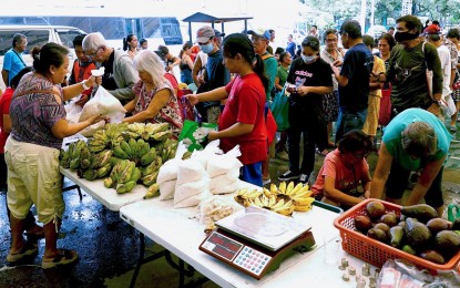 <p><strong>FRESH AND AFFORDABLE.</strong> Buyers troop to the Bureau of Animal and Industry Kadiwa store in Visayas Avenue, Diliman, Quezon City on July 26, 2024. The Department of Agriculture announced on Monday (Aug. 26) the target expansion of more Kadiwa stores in Visayas and Mindanao in September.<em> (PNA photo by Ben Briones)</em></p>