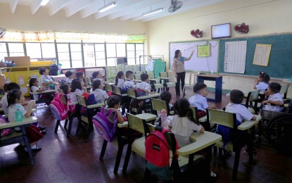 <p><strong>START OF CLASSES.</strong> Grade 1 students attend the second day of classes at Aurora A. Quezon Elementary School in Manila on July 30, 2024. Education Secretary Sonny Angara on Thursday (Aug. 1, 2024) expressed plans to hire additional administrative staff to further ease the workload of public school teachers. <em>(PNA photo by Yancy Lim)</em></p>