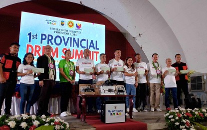 <p><strong>FINANCIAL AID. </strong>The provincial government releases PHP1 million in financial assistance to 43 local government units during the 1st Provincial DRRM Summit at the Pototan Astrodome in Pototan town on Wednesday (July 31, 2024). The summit gathered all local DRRM councils across Iloilo province for the first-ever summit showcasing advancements and resource capabilities in disaster management. <em>(PNA photo by Eljolene Tacadao WVSU-OJT )</em></p>