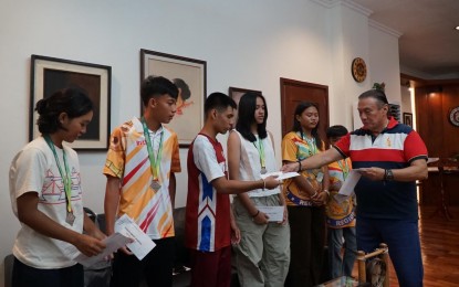 <p><strong>SPORTS HEROES</strong>. Laoag City mayor Michael Keon (rightmost) distributes cash incentives on  Wednesday (July 31, 2024) to athletes who won medals in the 2024 Palarong Pambansa. The gold medalist received PHP20,000 and those who won silver and bronze received PHP14,000, and PHP10,000, respectively. <em>(Photo courtesy of the City Government of Laoag)</em></p>