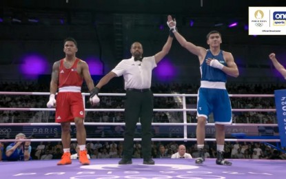 <p><strong>UPSET.</strong> Uzbekistan’s Turabek Khabibullaev (right) ousts the Philippines’ Eumir Felix Marcial via unanimous decision in the men's boxing 80kg round of 16 early Wednesday (July 31, 2024; PH time). Swimmer Kayla Sanchez followed him to the exit after failing to advance past the women’s 100m freestyle semifinals with a seventh-place finish in heat 2. <em>(Screenshot via Go for Gold PH)</em></p>