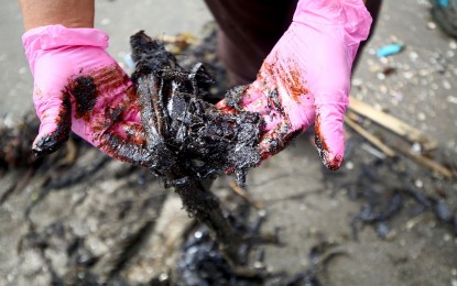 <p><strong>OIL SPILL.</strong> The oil spill off Limay, Bataan reaches Barangay Amaya 5, Tanza, Cavite on July 30, 2024. The Department of Environment and Natural Resources on Wednesday (Aug. 14) said it has started to engage local government units, especially those which host ports, to help them establish their own oil spill rapid response force. <em>(PNA photo by Joan Bondoc)</em></p>