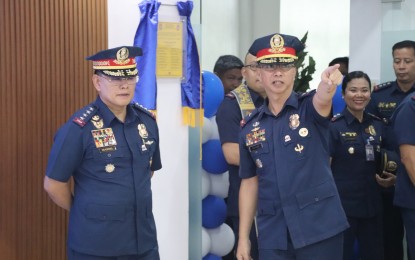 <p><strong>CAMP IMPROVEMENT</strong>. Philippine National Police (PNP) Chief Gen. Rommel Francisco Marbil (left) and PNP Eastern Visayas Regional Director Brig. Gen. Reynaldo Pawid (right) during the launching of the first satellite hub of the Permit to Carry Firearms Outside of Residence (PTCFOR) Secretariat inside the Police Regional Office 8 (PRO-8) compound Tuesday (July 30, 2024). The two officials also inaugurated the PRO-8 command center, the central coordination hub for all regional police operations. <em>(Photo courtesy of PRO-8)</em></p>