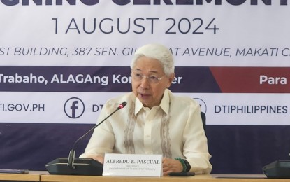 <p><strong>LAST DAY</strong>. Outgoing Department of Trade and Industry (DTI) Secretary Alfredo Pascual attends a signing ceremony on his last day of work as trade chief at the new DTI Office in Filinvest Building in Makati City on Aug. 1, 2024. Pascual submitted his resignation letter to President Ferdinand R. Marcos Jr. on Wednesday. <em>(PNA photo by Kris M. Crismundo)</em></p>