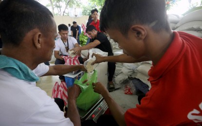 <p><strong>RICE FOR ALL</strong>. Consumers avail of the government’s Rice-For-All program at the Bureau of Plant Industry (BPI) in Manila on Aug. 1, 2024. The program is the "most approved" government initiative, according to the latest survey results conducted by Publicus Asia on Sept. 15-19. <em>(PNA photo by Yancy Lim)</em></p>