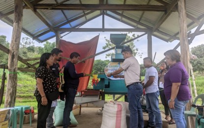 <p><strong>TURNOVER.</strong> Vivencio Lagahid (center), director of the DOLE-Negros Oriental, hands over a rice mill project to a farmers' association in Tayasan, Negros Oriental on July 30, 2024. DOLE has allocated PHP15 million this year for livelihood projects in Negros Oriental for the vulnerable sectors<em>. (Photo courtesy of DOLE-Negros Oriental Field Office Facebook Page)</em></p>