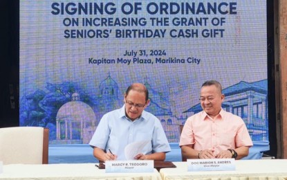 <p><strong>BIRTHDAY CASH GIFT.</strong> Marikina City Mayor Marcy Teodoro on Wednesday (July 31, 2024) signs Ordinance No. 40 Series of 2024 at the City Hall. The measure increases the birthday cash gift of elderly residents from PHP1,000 to PHP2,000.<em> (Photo courtesy of Marikina PIO)</em></p>