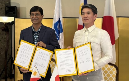 <p><strong>VOTER AWARENESS.</strong> Japan Ambassador Kazuya Endo (right) and United Nations Development Program (UNDP) Resident Representative Dr. Selva Ramachandran sign the exchange of notes for the voters' awareness project in the Bangsamoro Autonomous Region in Muslim Mindanao in a ceremony held in Makati City on Thursday (Aug. 1, 2024). The initiative seeks to promote the digitalization of the electoral process in the region. <em>(PNA photo by Joyce Rocamora)</em></p>