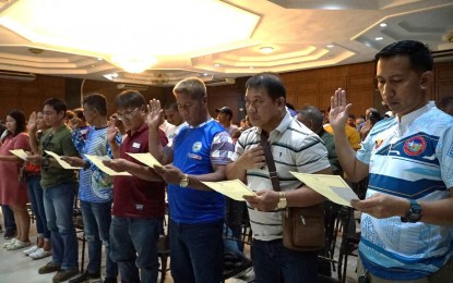 <p><strong>DEPUTIZED VOLUNTEER ENFORCERS</strong>. Some of the 225 village officials and 24 city government employees who were deputized as community-based law enforcers take their oath in Laoag City on July 26, 2024. Their deputization took effect this week after the issuance of their IDs and citation tickets. <em>(Photo courtesy of the City Government of Laoag)</em></p>
<div dir="auto"> </div>