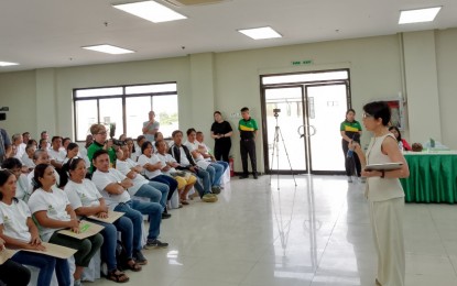 <p style="text-align: left;"><strong>FINANCIAL INCLUSION</strong>. Land Bank of the Philippines president and chief executive officer Lynette Ortiz (right) interacts with farmer-participants during the “Bilis Ipon: Digital Financial Inclusion Caravan” in Himamaylan City, Negros Occidental <span dir="ltr">on Wednesday afternoon</span> (July 31, 2024). The activity was held alongside the inauguration of the Landbank Himamaylan Branch beside the City Hall. <em>(PNA photo by Nanette Guadalquiver)</em></p>