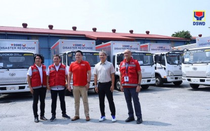 <p><strong>DISASTER RESPONSE CAPABILITY.</strong> Senator Joel Villanueva (2nd from right), Department of Social Welfare and Development (DSWD) Secretary Rex Gatchalian (3rd from left) and DSWD officials lead the ceremonial turnover and inspection of 11 delivery trucks and heavy-duty forklifts at the DSWD National Resource Operations Center (NROC) in Pasay City on Friday (August 2, 2024.). The equipment bolsters the DSWD’s response capabilities, especially in times of disaster. <em>(Photo courtesy of DSWD)</em></p>