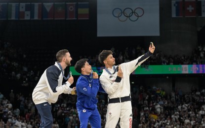 <div class="caption my-4">
<p><strong>BEST BOYS.</strong> Silver medalist Artem Dolgopyat of Israel, gold medalist Carlos Yulo of the Philippines and bronze medalist Jake Jarman of Great Britain (from left) take souvenir photos on the Paris Olympics podium for men's gymnastics floor exercise at Bercy Arena on Saturday (Aug. 3, 2024). Yulo gave the Philippines just its second gold in its 100-year participation in the Olympics. <em>(Photo courtesy of I<span class="x193iq5w xeuugli x13faqbe x1vvkbs x1xmvt09 x1lliihq x1s928wv xhkezso x1gmr53x x1cpjm7i x1fgarty x1943h6x xudqn12 x3x7a5m x6prxxf xvq8zen xo1l8bm xzsf02u x1yc453h" dir="auto">nternational Gymnastics Federation)</span></em></p>
</div>