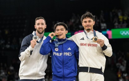 <p>Silver medalist Artem Dolgopyat of Israel, gold medalist Carlos Yulo of the Philippines, bronze medalist Jake Jarman of Great Britain (from left) <em>(Photo courtesy of International Gymnastics Federation)</em></p>