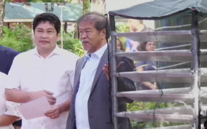 <p><strong>TURNOVER</strong>. Ruel Vincent Banal (left), Officer-in-Charge of the Department of Science and Technology-Misamis Oriental, turns over one of 90 portable solar dryers to the provincial government at the capitol grounds in Cagayan de Oro City on Monday (Aug. 5, 2024). The portasols for drying of grains will be distributed to listed farmer organizations in the province.<em> (Photo courtesy of MisOr-PIO)</em></p>